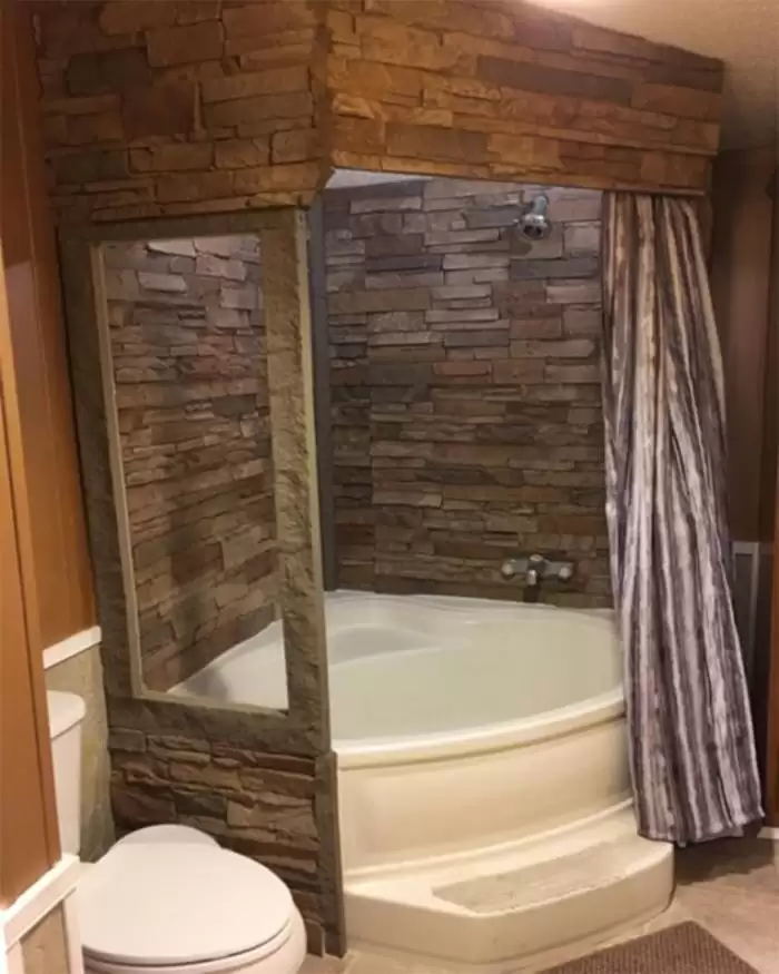 Transform your bathroom with a faux stone accent wall